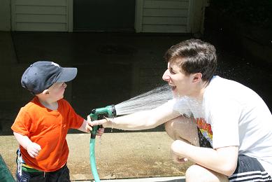 Tommy sprays Daddy
