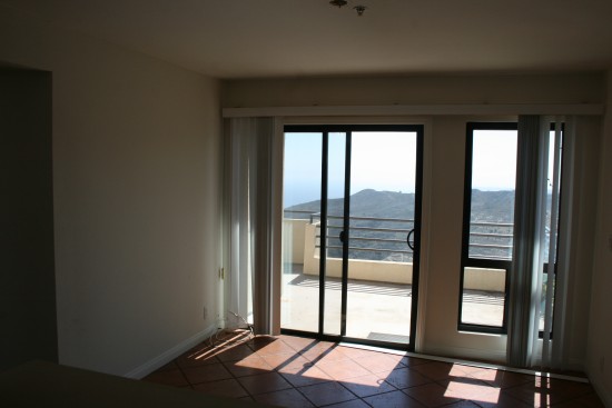 family room out to patio.  Any advice on window coverings appreciated.  I hate blinds, so I'm thinking roman shades?