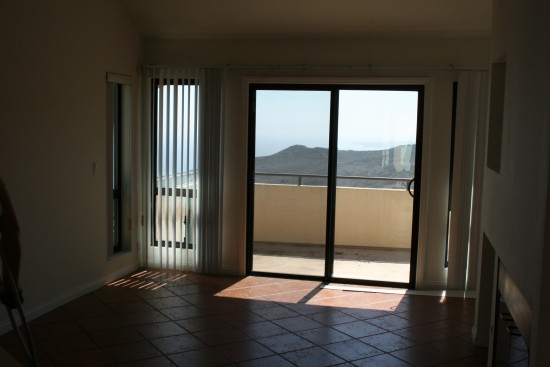 Living room.  Again, window treatment advice?  Lots of narrow windows to think about.