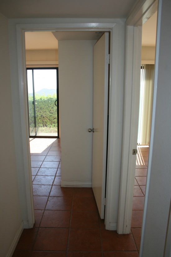 Coming out of Tommy's room, turning left, and looking into the girls' room on the left and the guest room/sewing room (!) on the right.