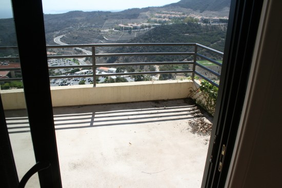 Back to the second floor, view out of the family room to the back patio and beyond.  That's the law school down to the left!
