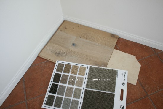 Flooring!  The hideous tile will be replaced by the hardwood on the main floor, tile in the bathrooms, and carpet in the bedrooms.  Apparently wider planks of wood are the "new thing" in flooring.  