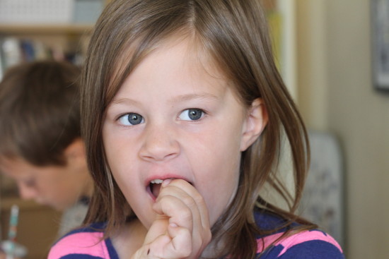 A very loose tooth can be a distraction during school time.